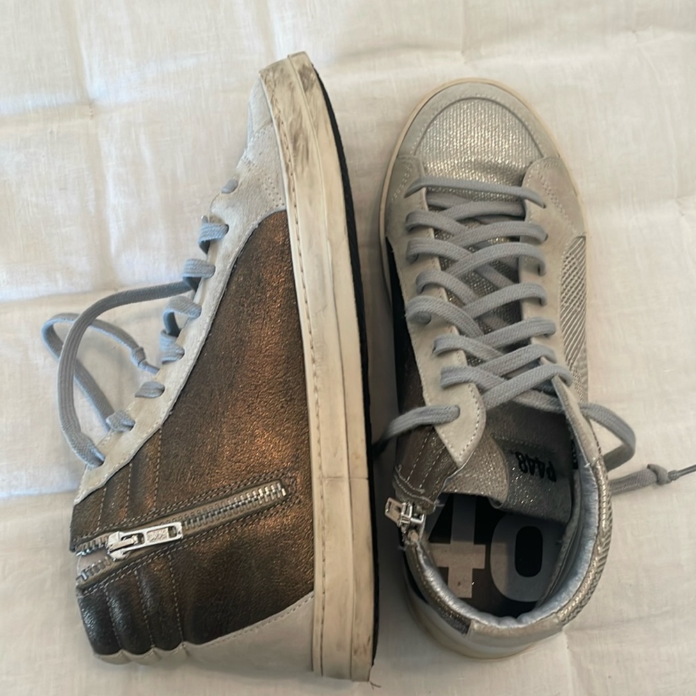 P448 high tops great condition silver gold size 40